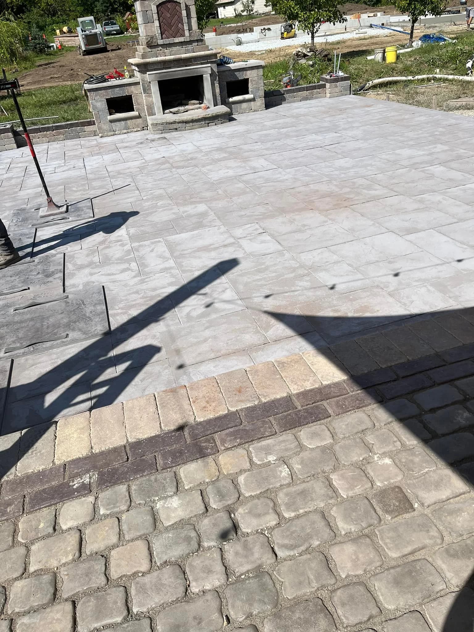 Custom backyard paver and chimney hardscape